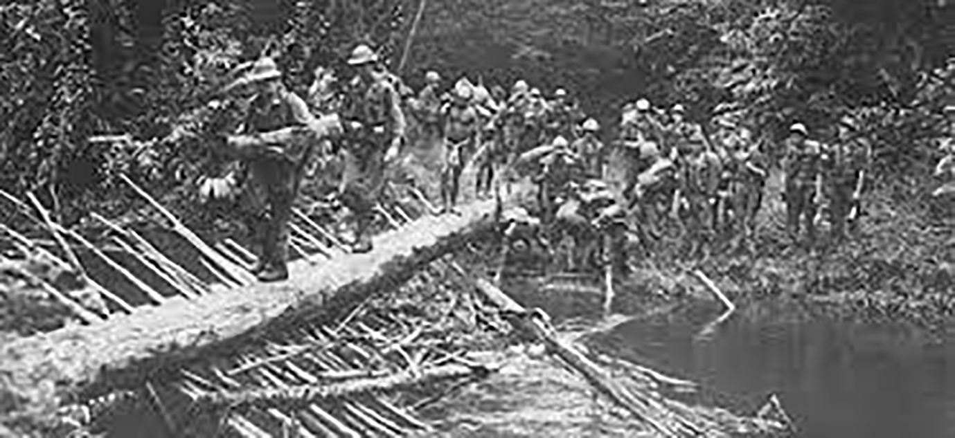 group of people completing the kokoda challenge team building activity