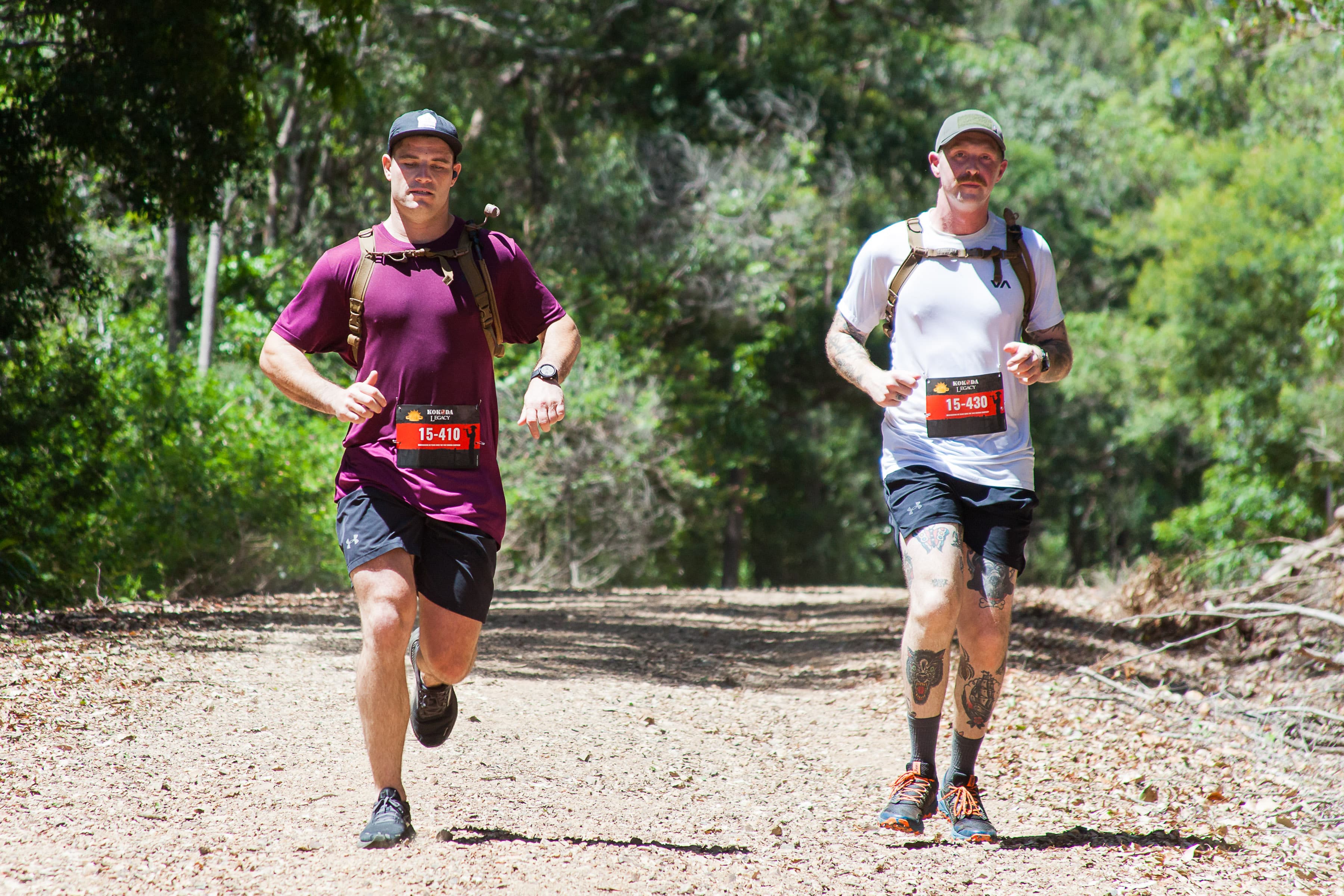 Two men trail running through Canungra for the Kokoda Legacy event